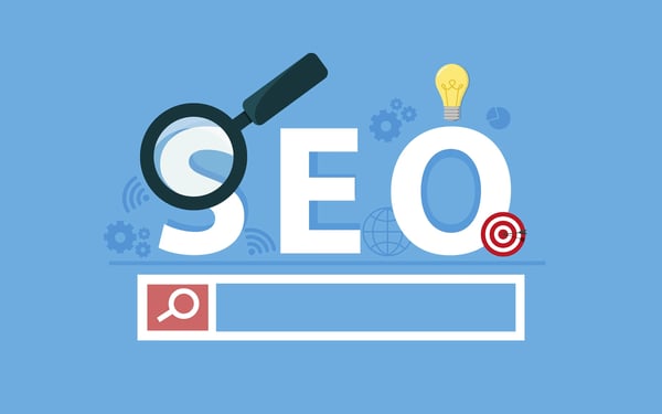 Sur cette illustration, une loupe de recherche pointe sur le SEO.