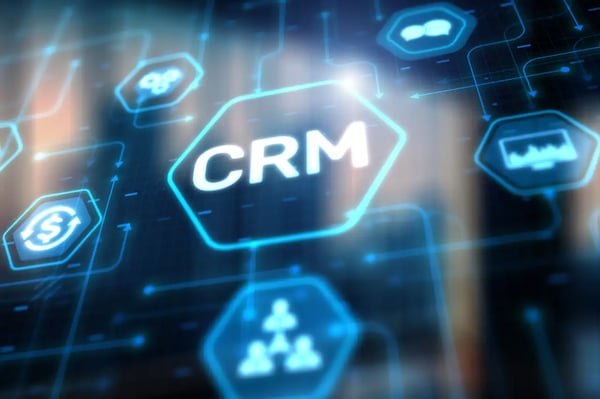 Illustration représentant un CRM HubSpot et ses fonctionnalités marketing, vente et service